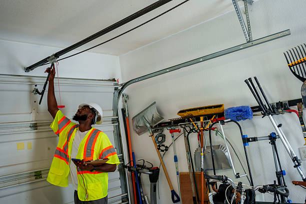 Professional Garage Door Installation technician working in Mattapoisett Center, MA